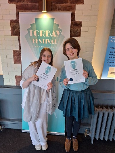 Students with their ceetificatea