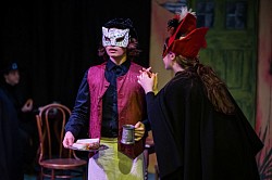 Students peeforming with masks